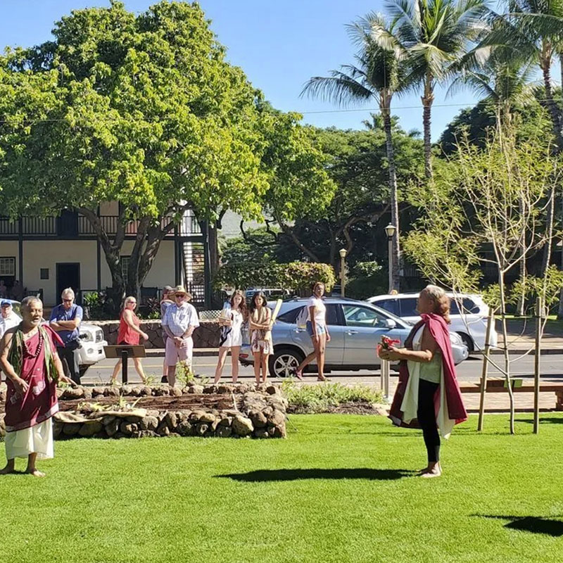 image of children in Lahaina planting trees